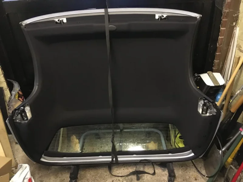 Hardtop on stand with strap.webp