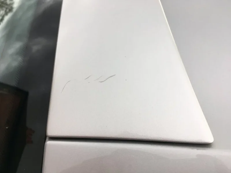 Hardtop spoiler drivers side mark.webp