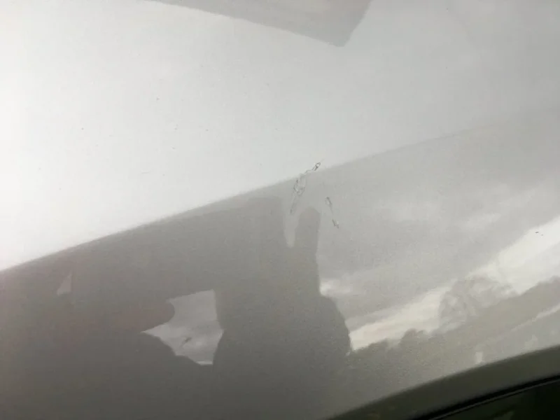 Hardtop passenger side mark above window.webp